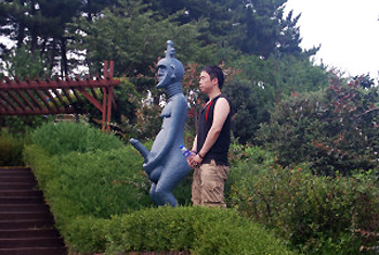 park statue and visitor