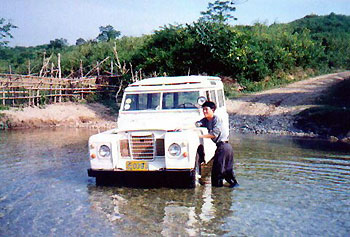 helping Land Rover cross river