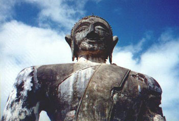 looking up at Buddha statue, Laos