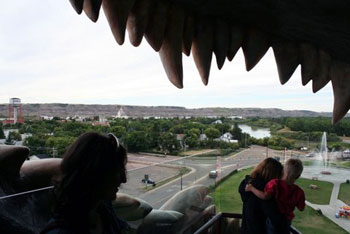 view of Drumheller through teeth of dinosaur