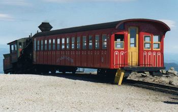 the colorlful passenger railroad car