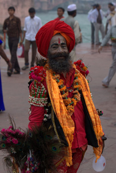colourfullly dressed man on ghat