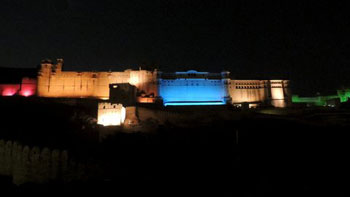 Amber Fort and Jaigarh Fort illuminated at night
