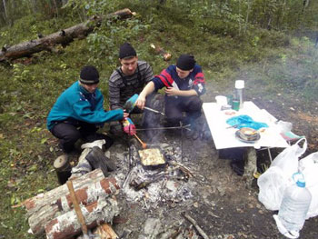 cooking over camp fire
