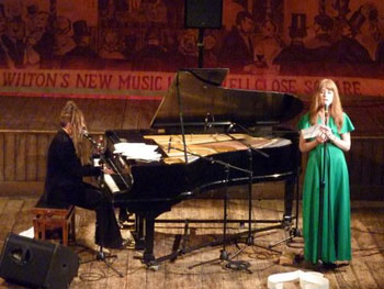 pianist and singer on music hall stage