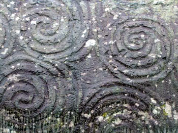 geometric design carved into Newgrange stone