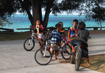 island children on bicycles