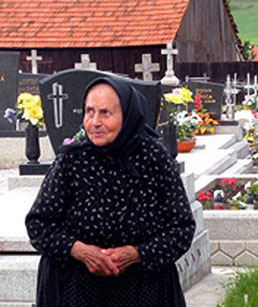 elderly woman in mourning dress