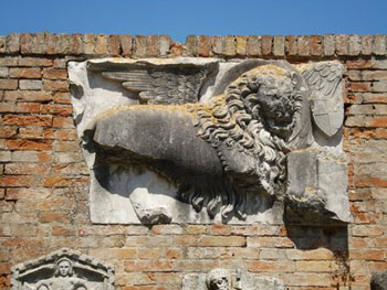 broken frieze of lion, symbol of St. Mark