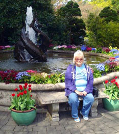 the author, Ruth Kozak, at fountain in Butchart Gardens