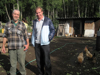 the author on an Anchorage farm with chickens