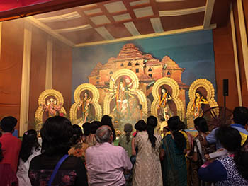 Devotees in front of the Goddess