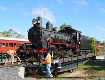 Historic steam locomotive engine on turntable at Bympie railway station