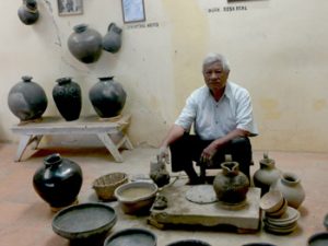Oaxaca potter and his vases