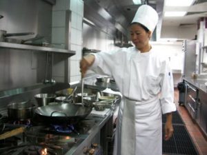 Thai chef in kitchen