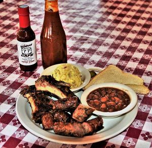 platte of barbecue ribs and beans