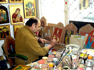 Dimitris Zazanis painting a Greek icon