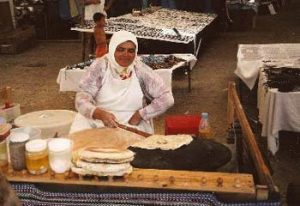 cooking flatbread in Turkish cafe