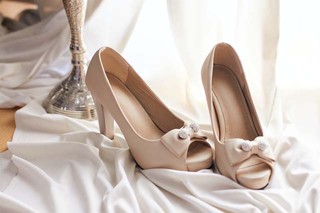 luxury shoes on white cloth