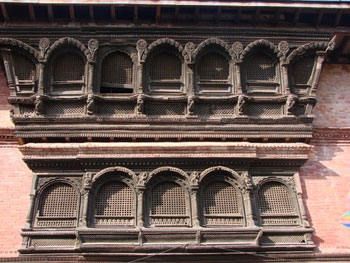 carved wooden windows