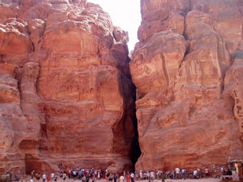 tourists at cliffs in Petra, Jordan