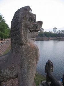 Lion statue near lake