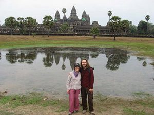 the author in front of water and temples