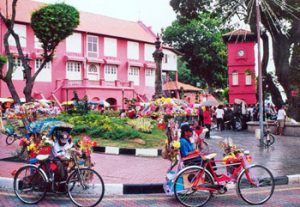 trishaws in Malacca traffic