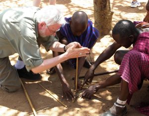 Robert Scheer making fire in Kenya