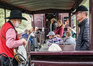 musicians in rail car