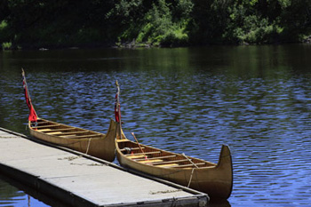 canoes at Fort William dock
