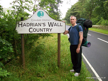 the author, Marc Latham, at Hadrian's Wall Country sign