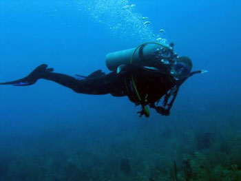 SCUBA diver under water