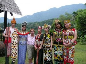 the author with performers in tradional regalia