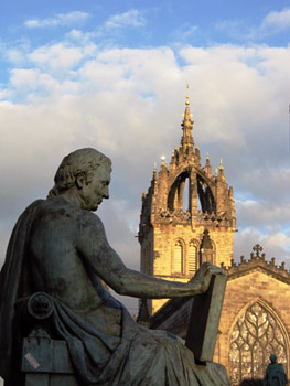 statue of David Hume with St. Giles' cathedral behind