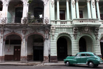 vintage car and historic building in Havana Cuba