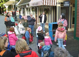 Clown performs to crowd at Burnaby Village Museum