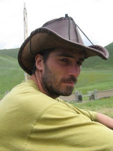 the author riding a horse in Tibet