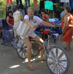 the author on a bicycle in San Patricio Melaque indigenous people’s market