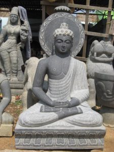 stone carving of Buddha