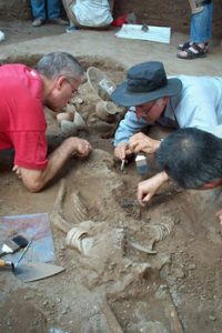 Dr. Charles Higham at archaeological dig