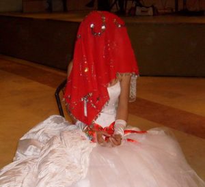 bride wearing red veil