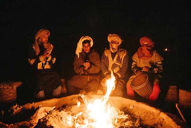 people at fire in Morocco desert