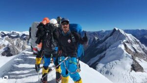 mountain climbers on Mt Everest summit