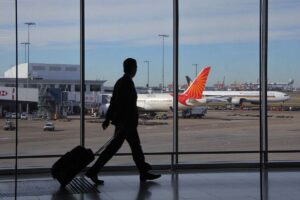 traveler arriving in airport